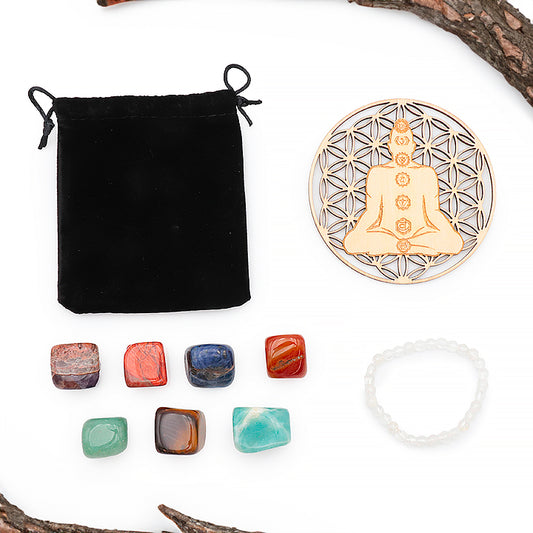 "Coffret découverte 7 chakras en précommande : pierres naturelles, bracelet cristal de roche et plaque fleur de vie. Un kit bien-être pour équilibrer vos énergies."